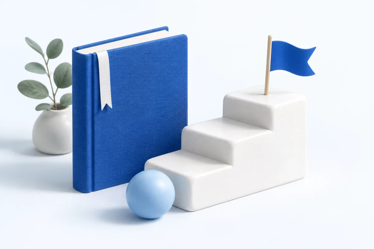 A blue study book beside small white steps and a blue flag
